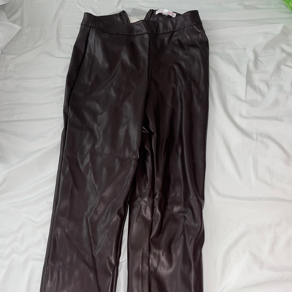 Brown leather pants size small. Never worn